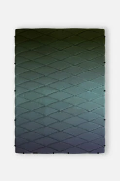 Nomadix Puffer Blanket -clothing shop nomadix pb glow 101 puffer blanket front